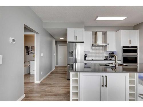 402-11 Mahogany Circle Se, Calgary, AB - Indoor Photo Showing Kitchen