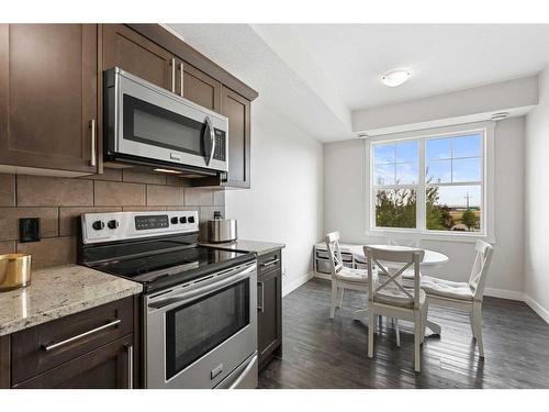 196 Cranford Walk Se, Calgary, AB - Indoor Photo Showing Kitchen With Stainless Steel Kitchen