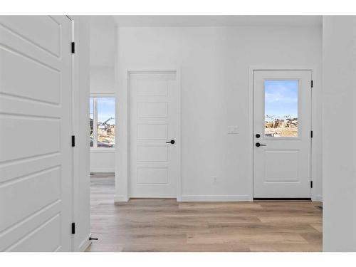 669 Lambeau Link Se, Airdrie, AB - Indoor Photo Showing Kitchen With Stainless Steel Kitchen With Upgraded Kitchen