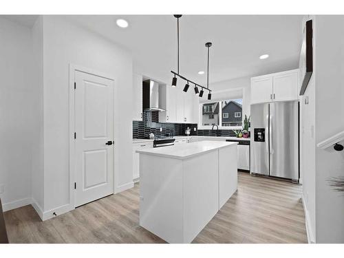 36 Heirloom Crescent Se, Calgary, AB - Indoor Photo Showing Kitchen With Upgraded Kitchen