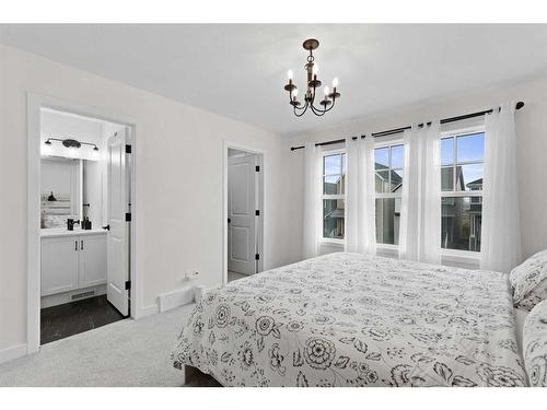 36 Heirloom Crescent Se, Calgary, AB - Indoor Photo Showing Bedroom