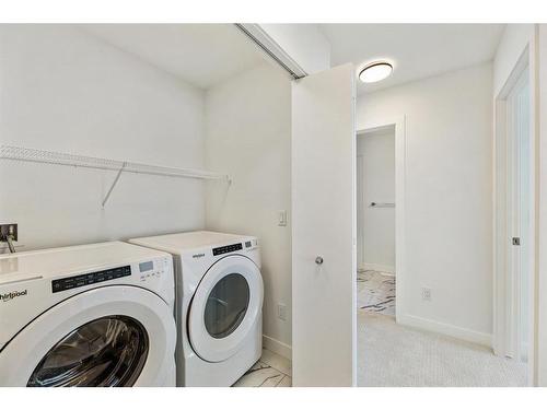 1603-280 Chelsea Road, Chestermere, AB - Indoor Photo Showing Laundry Room