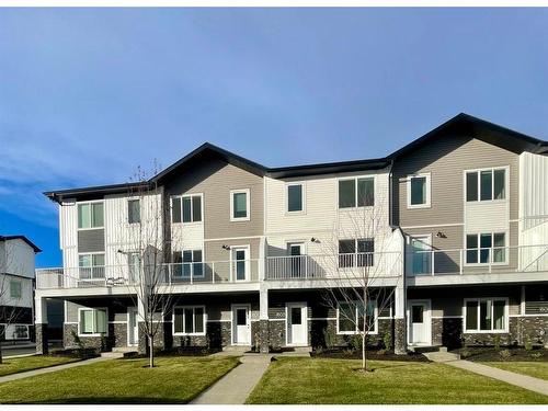 1603-280 Chelsea Road, Chestermere, AB - Outdoor With Facade