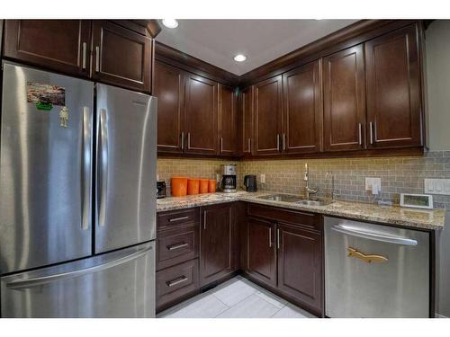 427 Trafford Drive Nw, Calgary, AB - Indoor Photo Showing Kitchen With Double Sink