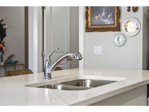 292 Canals Crossing Sw, Airdrie, AB - Indoor Photo Showing Kitchen With Double Sink