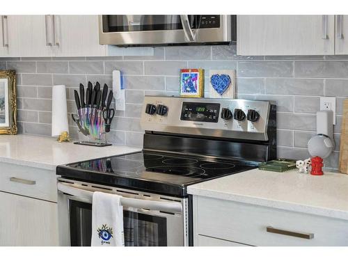 292 Canals Crossing Sw, Airdrie, AB - Indoor Photo Showing Kitchen With Upgraded Kitchen