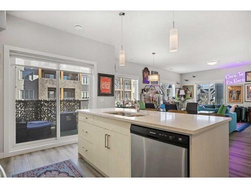 292 Canals Crossing Sw, Airdrie, AB - Indoor Photo Showing Kitchen With Double Sink With Upgraded Kitchen