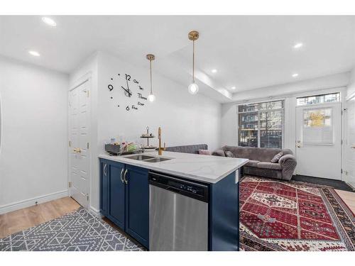 4327 Seton Drive Se, Calgary, AB - Indoor Photo Showing Kitchen With Double Sink