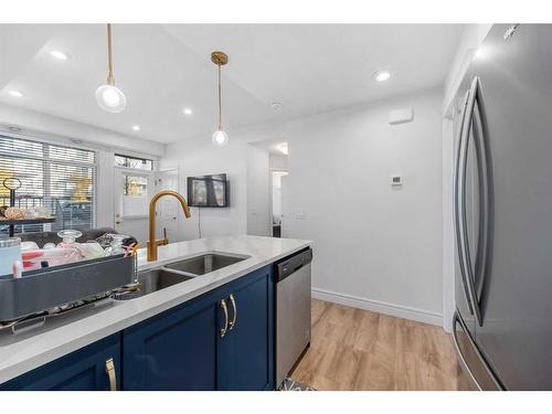 4327 Seton Drive Se, Calgary, AB - Indoor Photo Showing Kitchen With Double Sink With Upgraded Kitchen