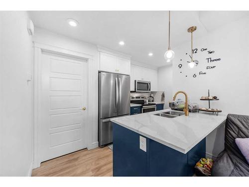 4327 Seton Drive Se, Calgary, AB - Indoor Photo Showing Kitchen With Double Sink With Upgraded Kitchen