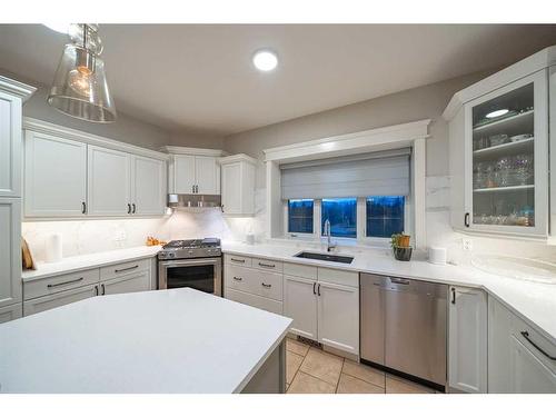 27 Corral View, Rural Rocky View County, AB - Indoor Photo Showing Kitchen With Upgraded Kitchen