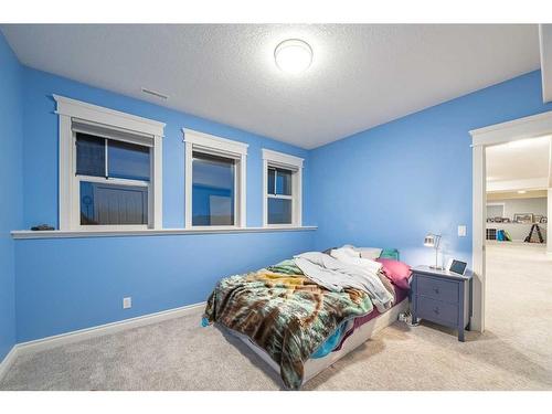 27 Corral View, Rural Rocky View County, AB - Indoor Photo Showing Bedroom