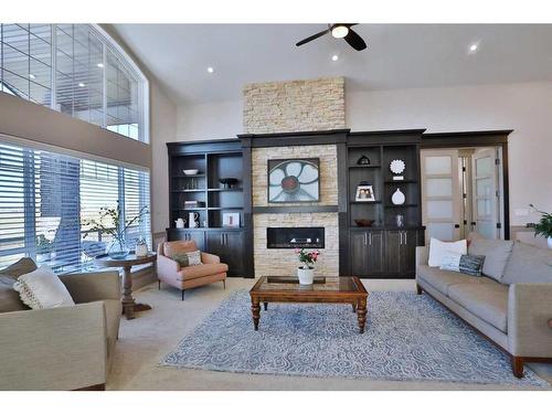 5 Rockyvale Green Nw, Calgary, AB - Indoor Photo Showing Living Room With Fireplace