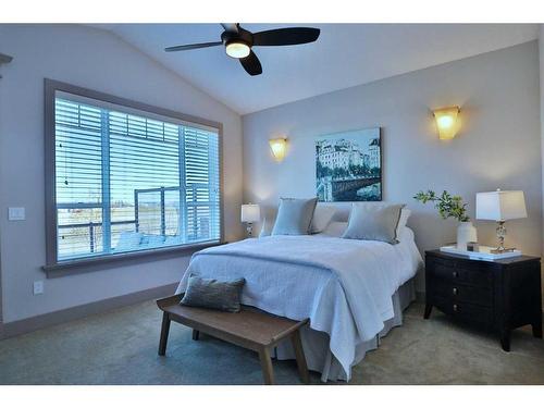 5 Rockyvale Green Nw, Calgary, AB - Indoor Photo Showing Bedroom