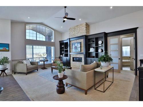 5 Rockyvale Green Nw, Calgary, AB - Indoor Photo Showing Living Room With Fireplace