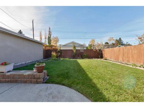 50 Grafton Crescent Sw, Calgary, AB - Outdoor With Backyard