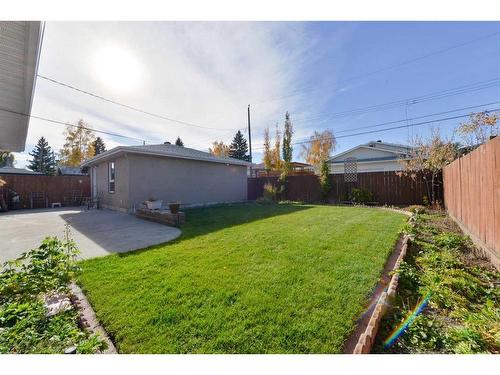 50 Grafton Crescent Sw, Calgary, AB - Outdoor With Backyard