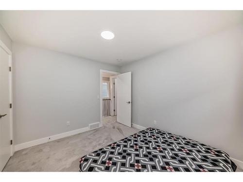 167 Sandpiper Bend, Chestermere, AB - Indoor Photo Showing Bedroom