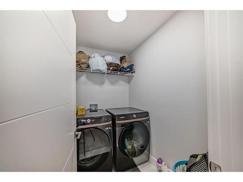 167 Sandpiper Bend, Chestermere, AB - Indoor Photo Showing Laundry Room