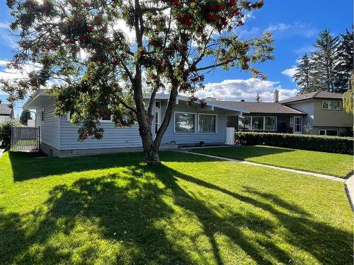 5748 Lodge Crescent Sw, Calgary, AB - Outdoor With Deck Patio Veranda