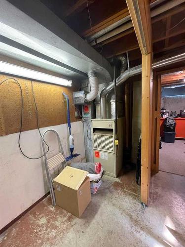 5748 Lodge Crescent Sw, Calgary, AB - Indoor Photo Showing Basement