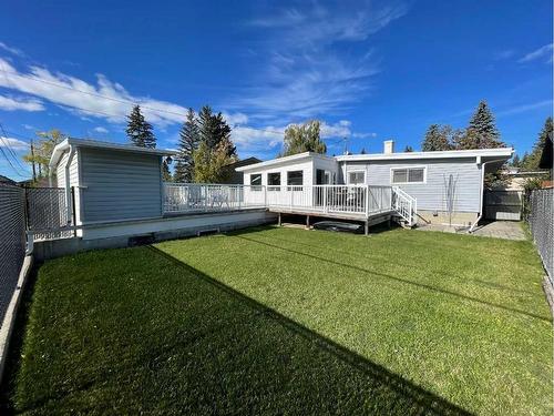 5748 Lodge Crescent Sw, Calgary, AB - Outdoor With Deck Patio Veranda