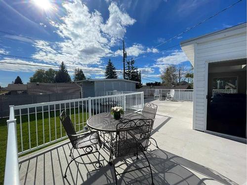 5748 Lodge Crescent Sw, Calgary, AB - Outdoor With Deck Patio Veranda