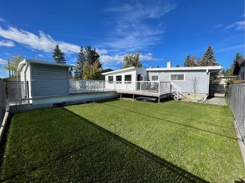 5748 Lodge Crescent Sw, Calgary, AB - Outdoor With Deck Patio Veranda