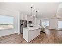 301-280 Chelsea Road, Chestermere, AB  - Indoor Photo Showing Kitchen With Upgraded Kitchen 