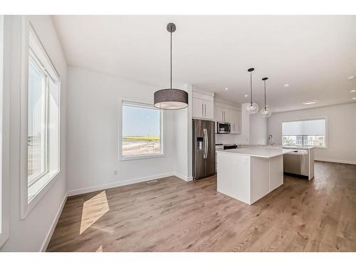 301-280 Chelsea Road, Chestermere, AB - Indoor Photo Showing Kitchen With Upgraded Kitchen