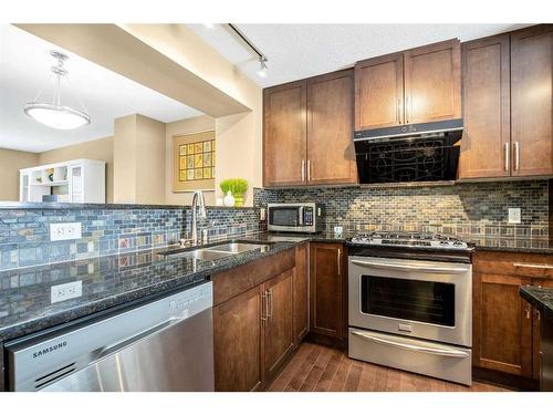 19 Aspen Hills Common Sw, Calgary, AB - Indoor Photo Showing Kitchen With Double Sink