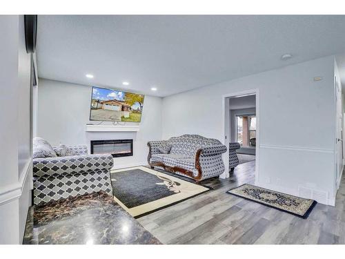 2490 Catalina Boulevard Ne, Calgary, AB - Indoor Photo Showing Other Room With Fireplace