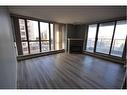 503-650 10 Street Sw, Calgary, AB  - Indoor Photo Showing Living Room With Fireplace 