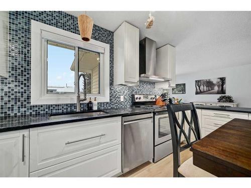 63 Macewan Glen Road Nw, Calgary, AB - Indoor Photo Showing Kitchen