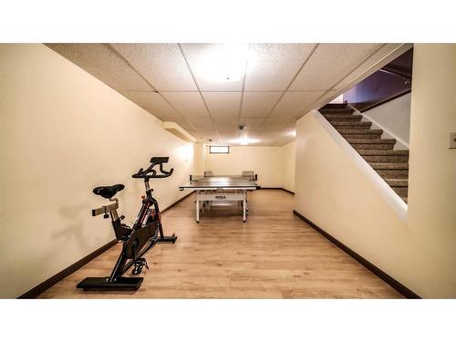 16 Abbercove Drive Se, Calgary, AB - Indoor Photo Showing Gym Room