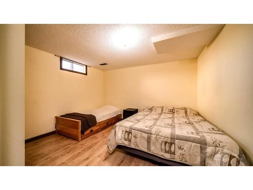 16 Abbercove Drive Se, Calgary, AB - Indoor Photo Showing Bedroom