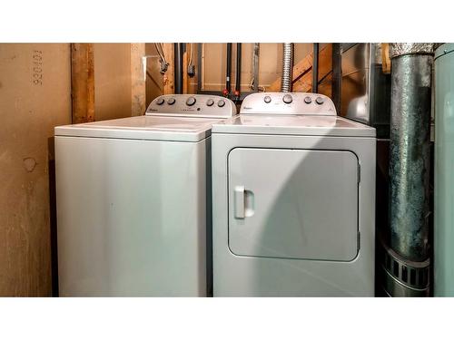 16 Abbercove Drive Se, Calgary, AB - Indoor Photo Showing Laundry Room