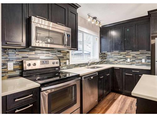 180 Auburn Meadows Boulevard Se, Calgary, AB - Indoor Photo Showing Kitchen With Stainless Steel Kitchen With Double Sink With Upgraded Kitchen