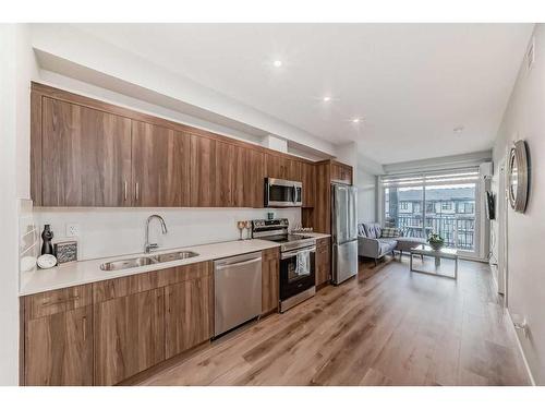 5407-200 Seton Circle Se, Calgary, AB - Indoor Photo Showing Kitchen With Stainless Steel Kitchen With Double Sink