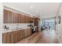 5407-200 Seton Circle Se, Calgary, AB  - Indoor Photo Showing Kitchen With Stainless Steel Kitchen With Double Sink 