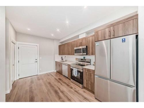 5407-200 Seton Circle Se, Calgary, AB - Indoor Photo Showing Kitchen With Stainless Steel Kitchen