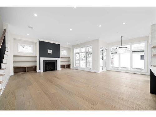 4318 4A Street Sw, Calgary, AB - Indoor Photo Showing Living Room With Fireplace