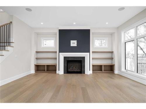 4318 4A Street Sw, Calgary, AB - Indoor Photo Showing Living Room With Fireplace