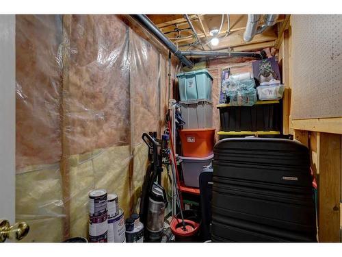 22 Hunters Gate, Okotoks, AB - Indoor Photo Showing Basement