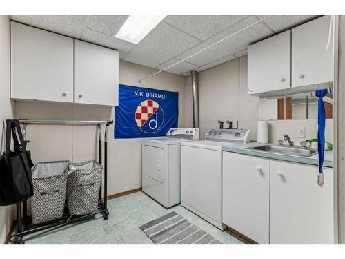 535 Markerville Road Ne, Calgary, AB - Indoor Photo Showing Laundry Room