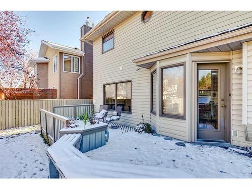 56 Woodford Close Sw, Calgary, AB - Outdoor With Deck Patio Veranda With Exterior