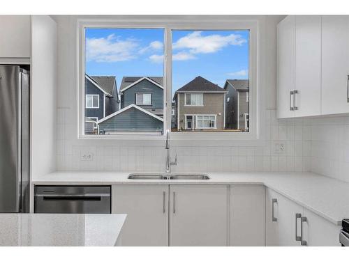 355 Magnolia Drive Se, Calgary, AB - Indoor Photo Showing Kitchen With Double Sink