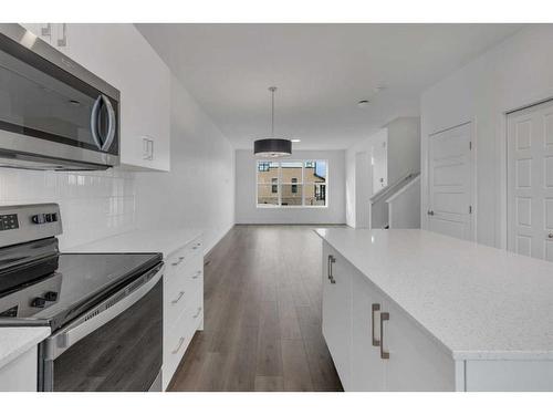 355 Magnolia Drive Se, Calgary, AB - Indoor Photo Showing Kitchen With Upgraded Kitchen