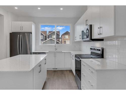 355 Magnolia Drive Se, Calgary, AB - Indoor Photo Showing Kitchen With Stainless Steel Kitchen With Upgraded Kitchen