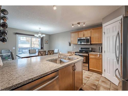 970 Reunion Gateway Nw, Airdrie, AB - Indoor Photo Showing Kitchen With Double Sink